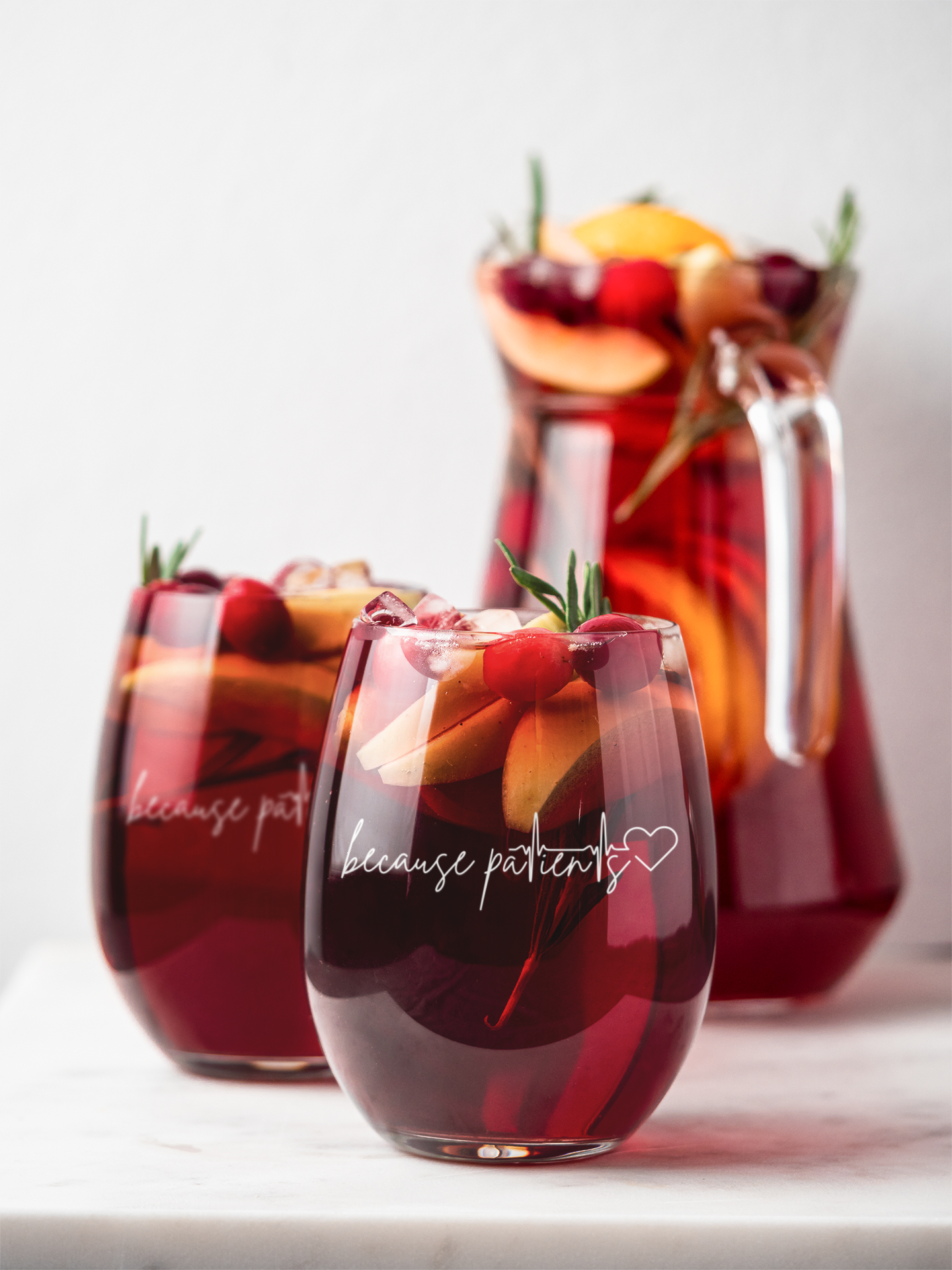 Because Patients Stemless wine glass with white text
